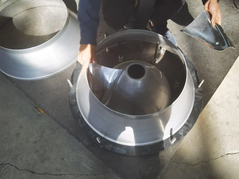 Mixed flow fan impeller assembly