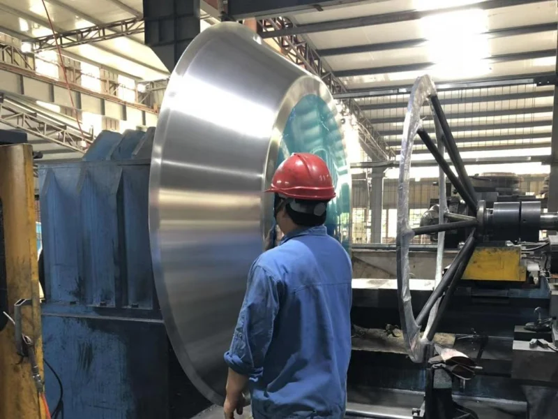 Roof fan rain cap spinning